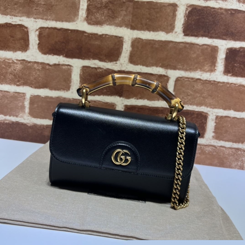 G*u*i top handle bags